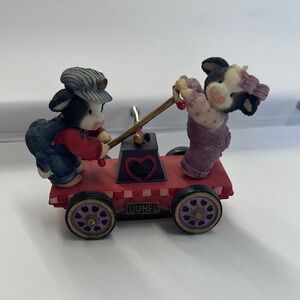 Lionel Cow Figurine on Red Cart